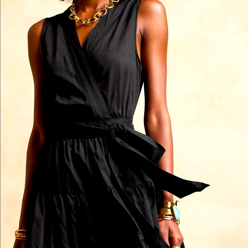 Brand new, sleeveless wrap dress.